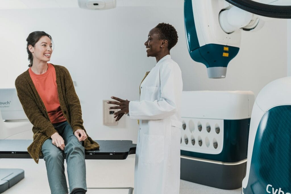 Surgeon discussing treatment for hiatal hernia with a patient