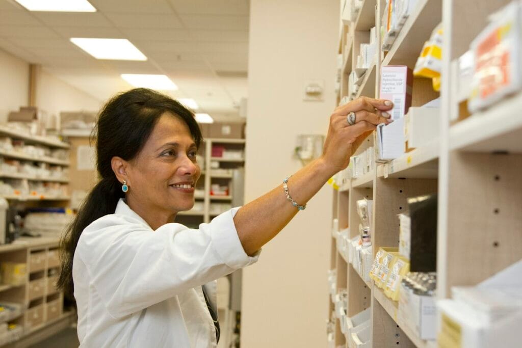 Pharmacist choosing a laxative for constipation after surgery